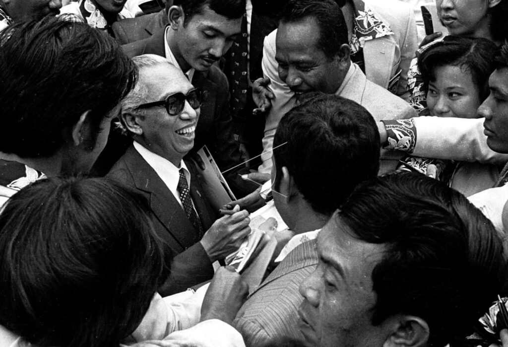 Vice President Adam Malik Surrounded by Athletes