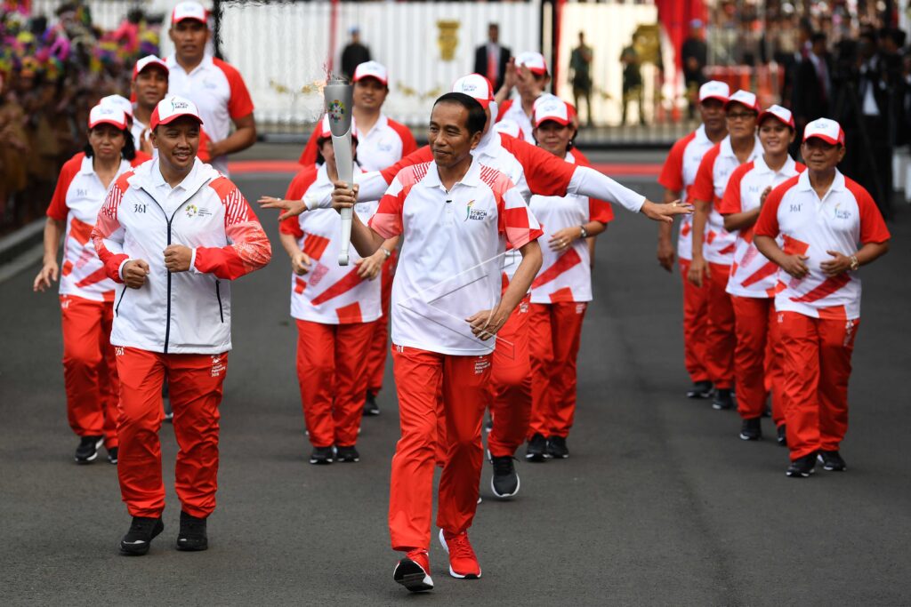 PRESIDENT ACCEPTS TORCH OF 18TH ASIAN GAMES
