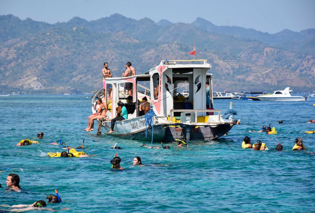 SNORKELING AT GILI MENO WATERS