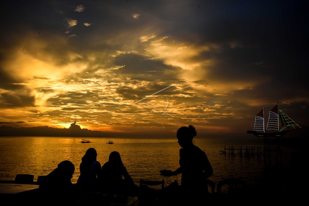 SUNSETS ON AMPENAN BEACH