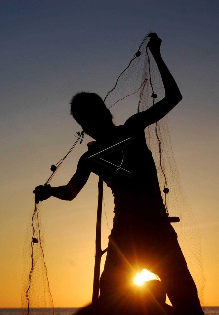 FISHERMAN IN KETAPING BEACH
