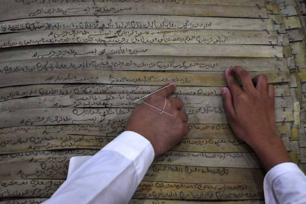 QURAN ON PALM LEAVES