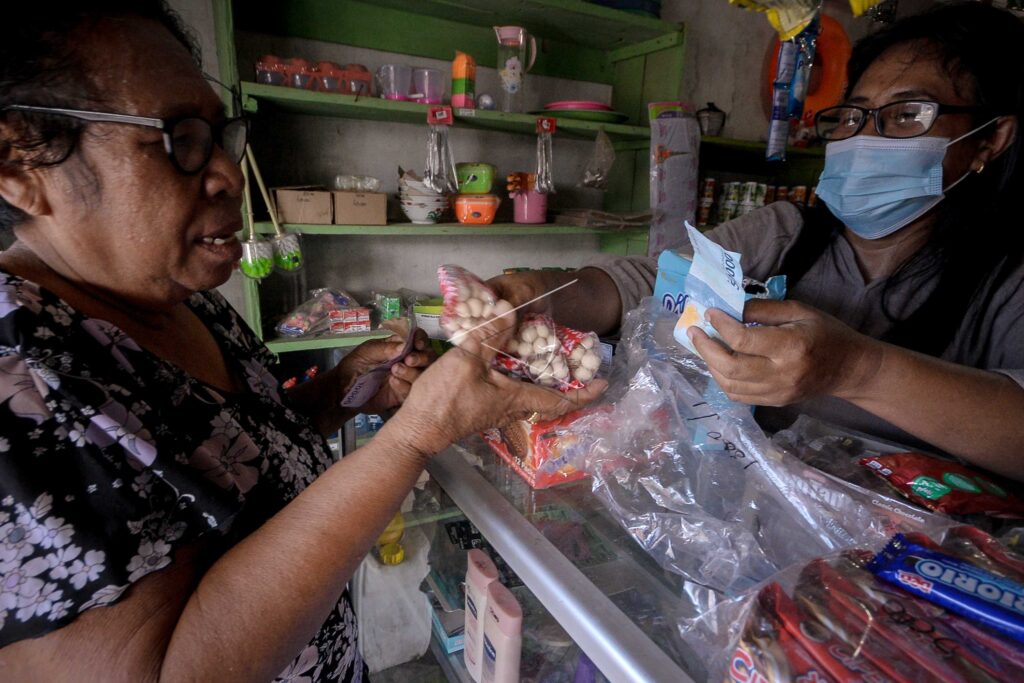 MENJAGA KEDAULATAN DENGAN RUPIAH